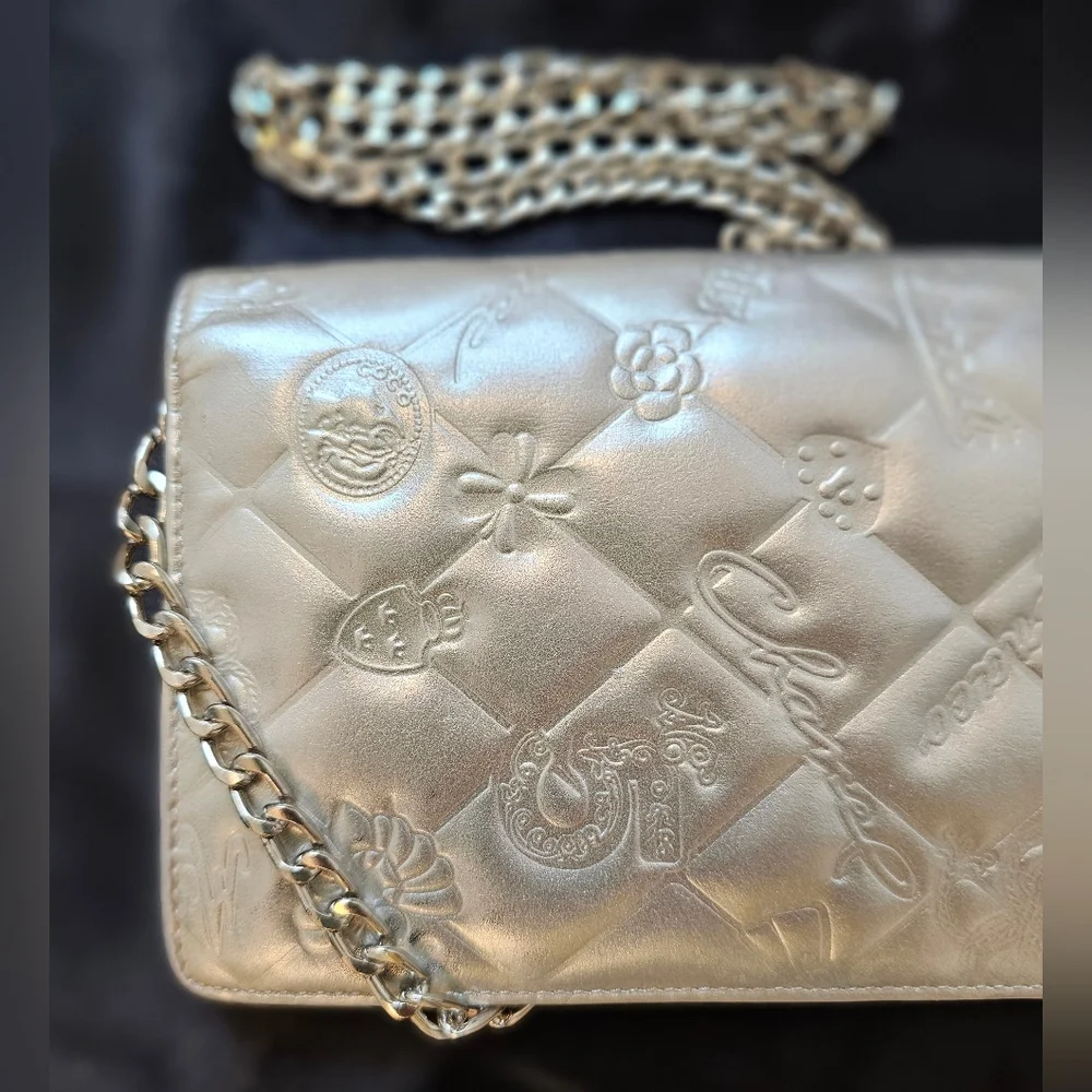 Chanel Silver Bifold Embossed Wallet with Silver Chain